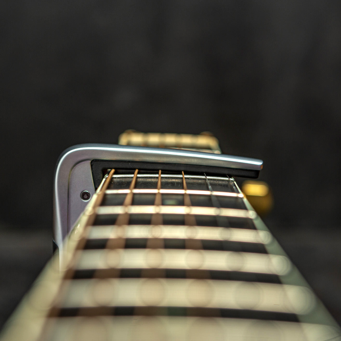Dunlop - 63CSC Trigger Fly Capo Curved S Chrome - Musik Utan Gränser 